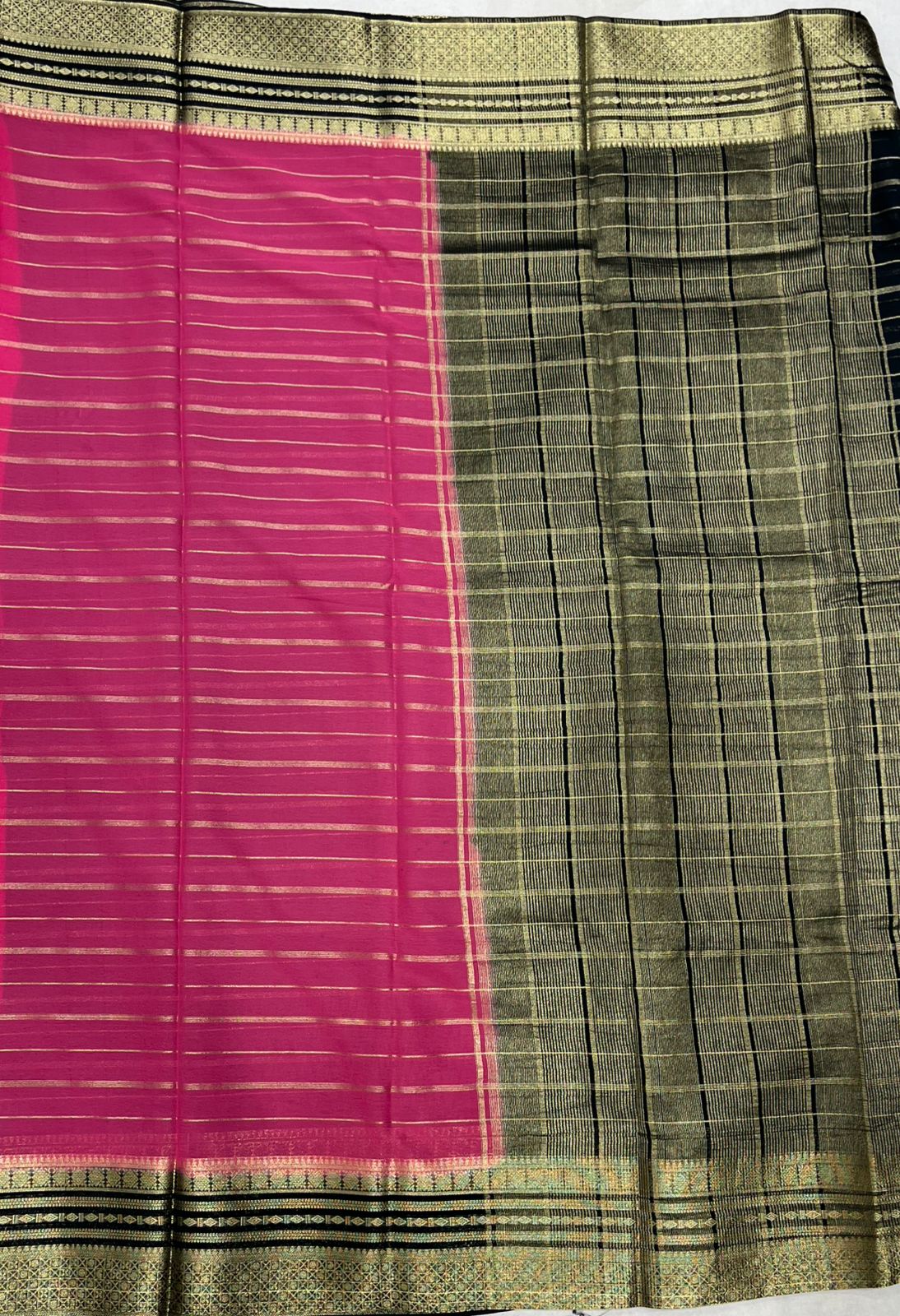Pink Elegant Striped Crape Saree with Green border.