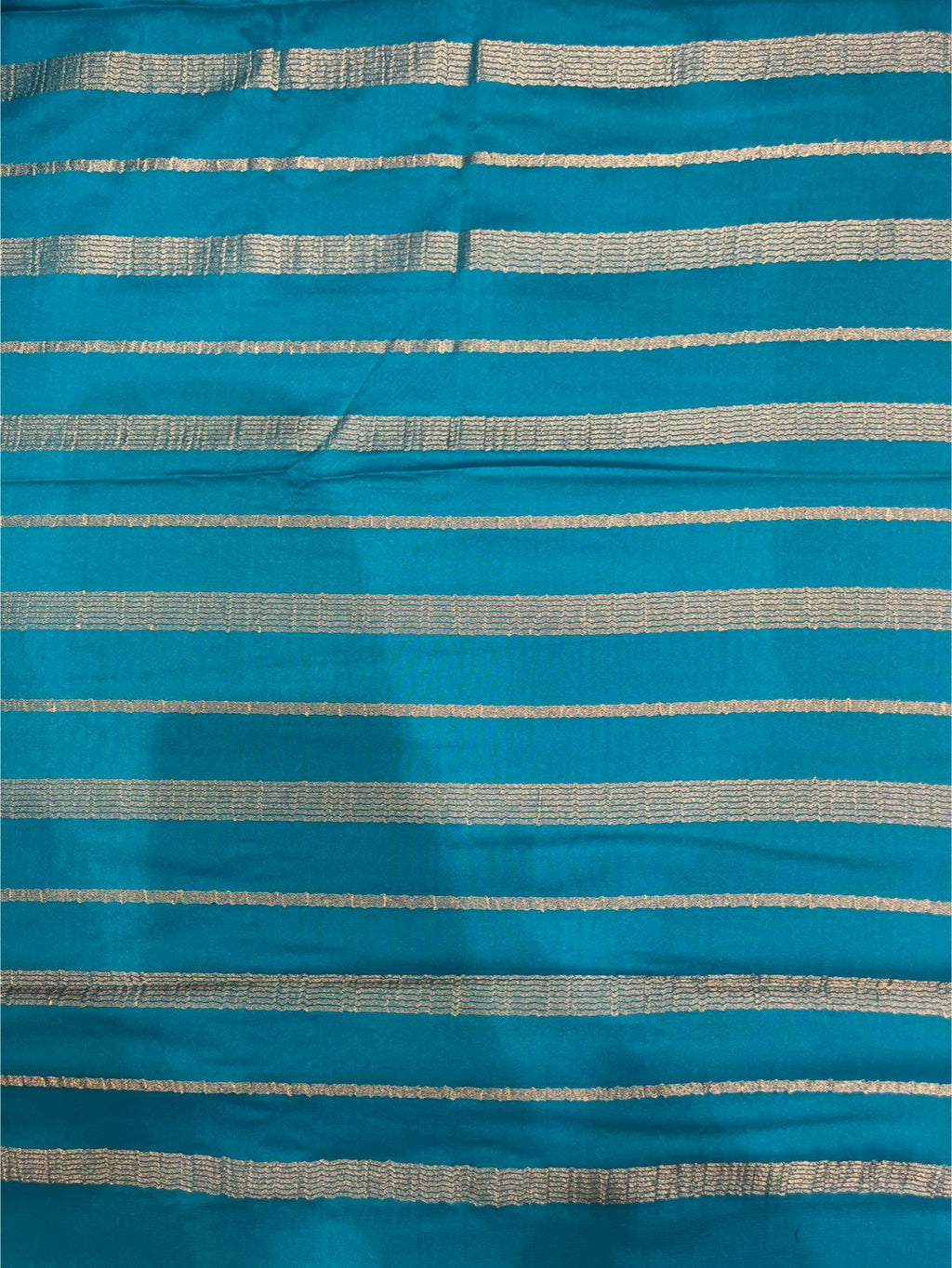 Graceful Sky Blue Solid Crape Saree – Silk Studio Collection