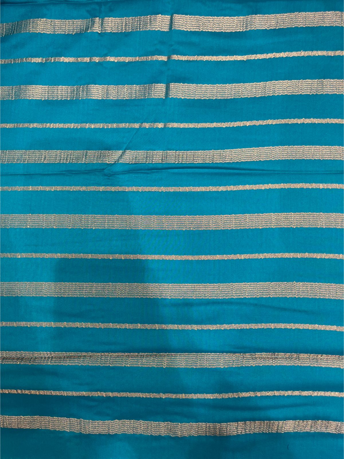 Graceful Sky Blue Solid Crape Saree – Silk Studio Collection