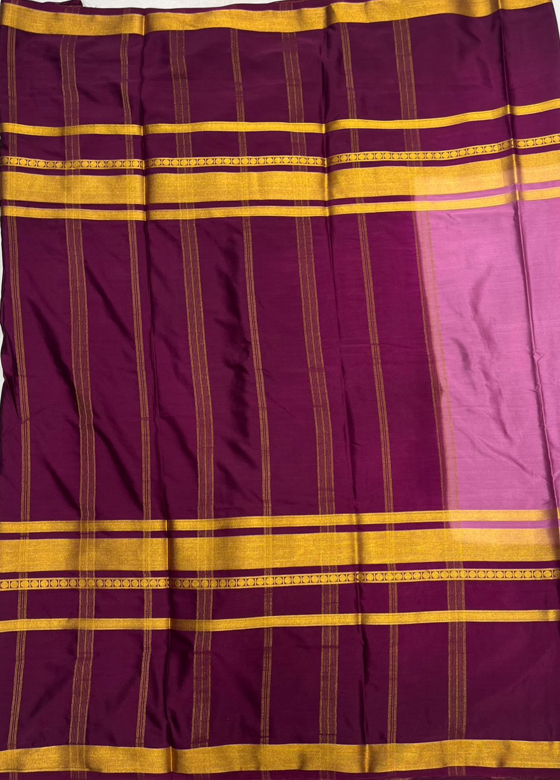 Pink Crape Saree with Premium Wine and Golden border.