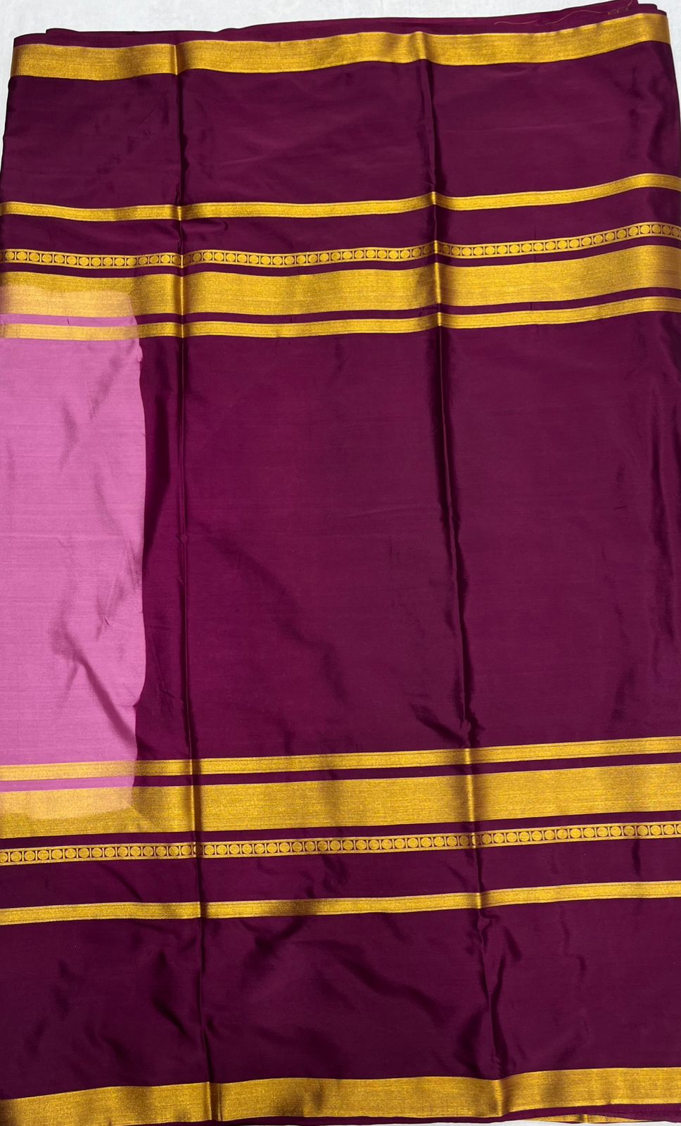 Pink Crape Saree with Premium Wine and Golden border.