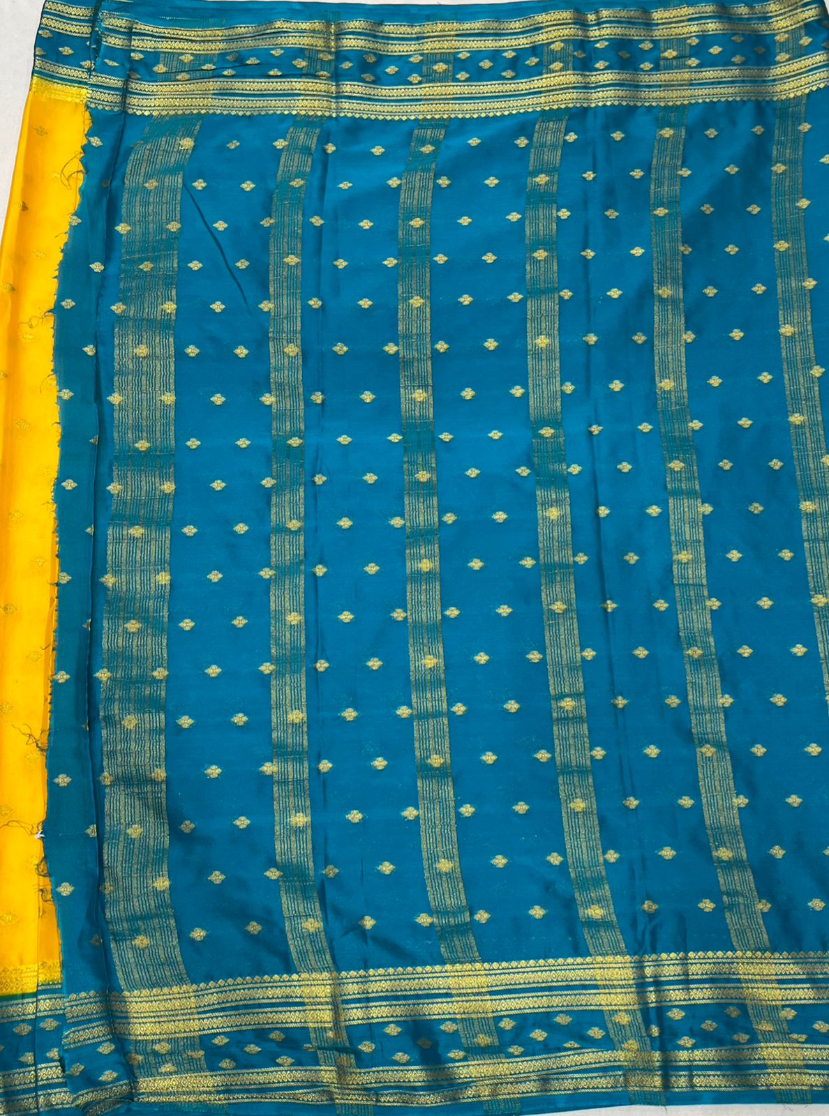Premium Yellow Crape Saree with Blue Border.