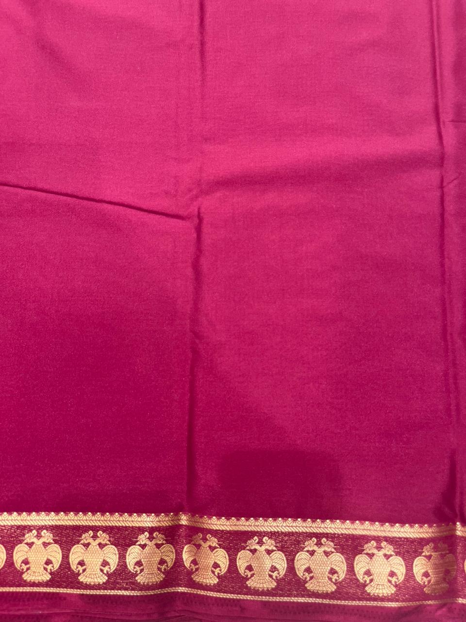 Silk Studio Maroon Crape Saree with Elegant Solid Design