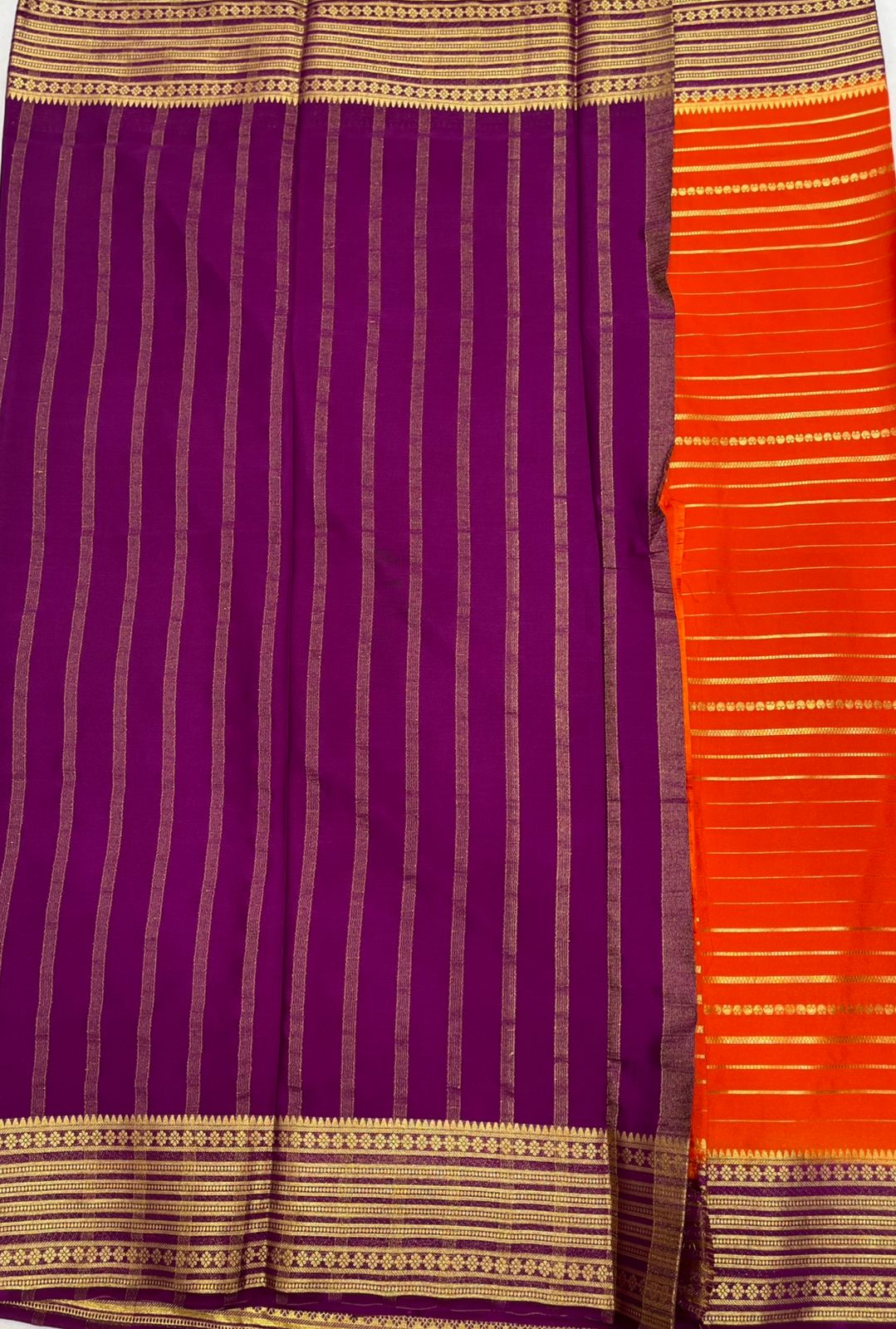 Orange Premium Crape Striped Saree with Purple border.