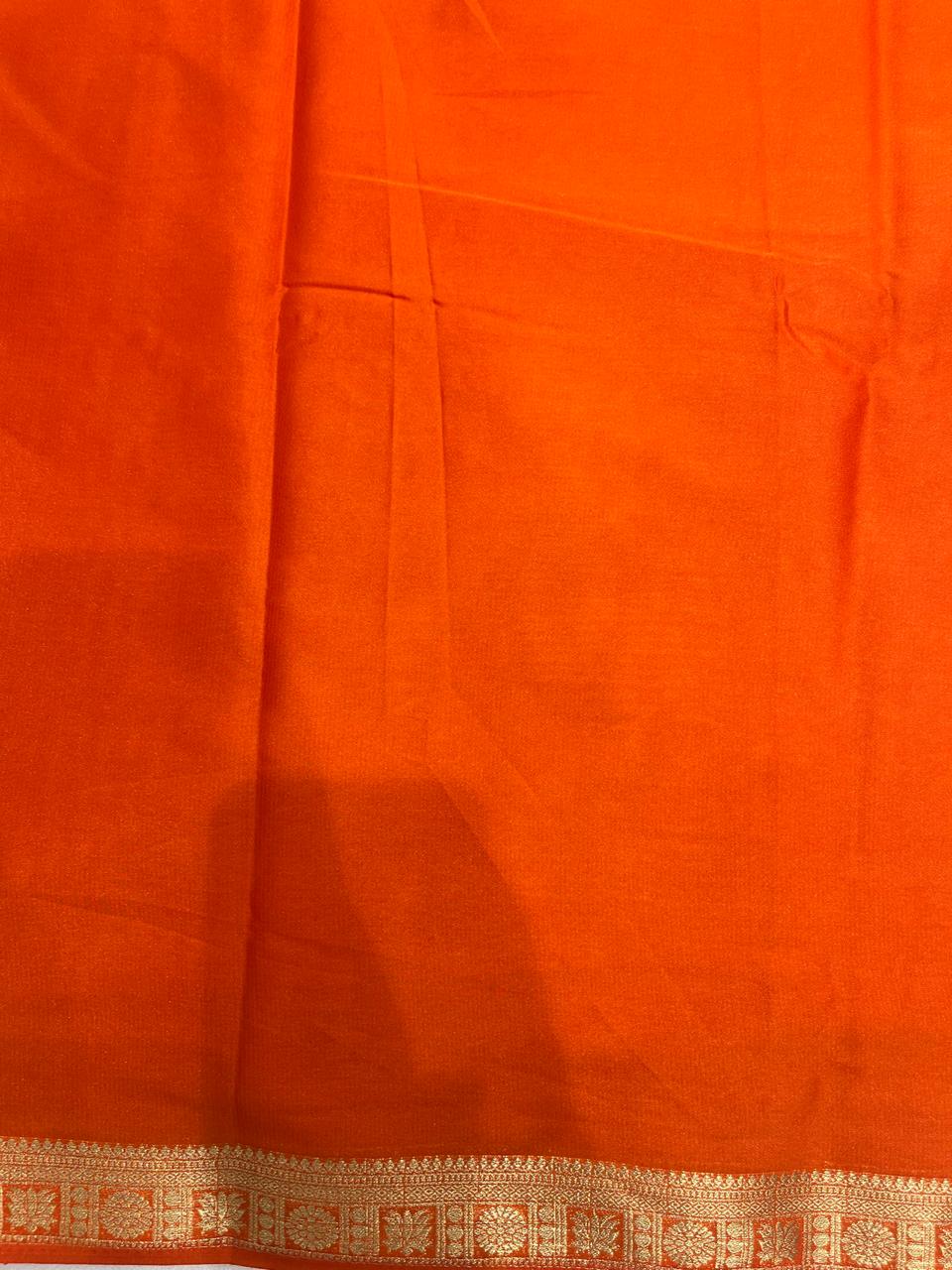 Graceful Orange Crape Saree – Silk Studio Festive Collection