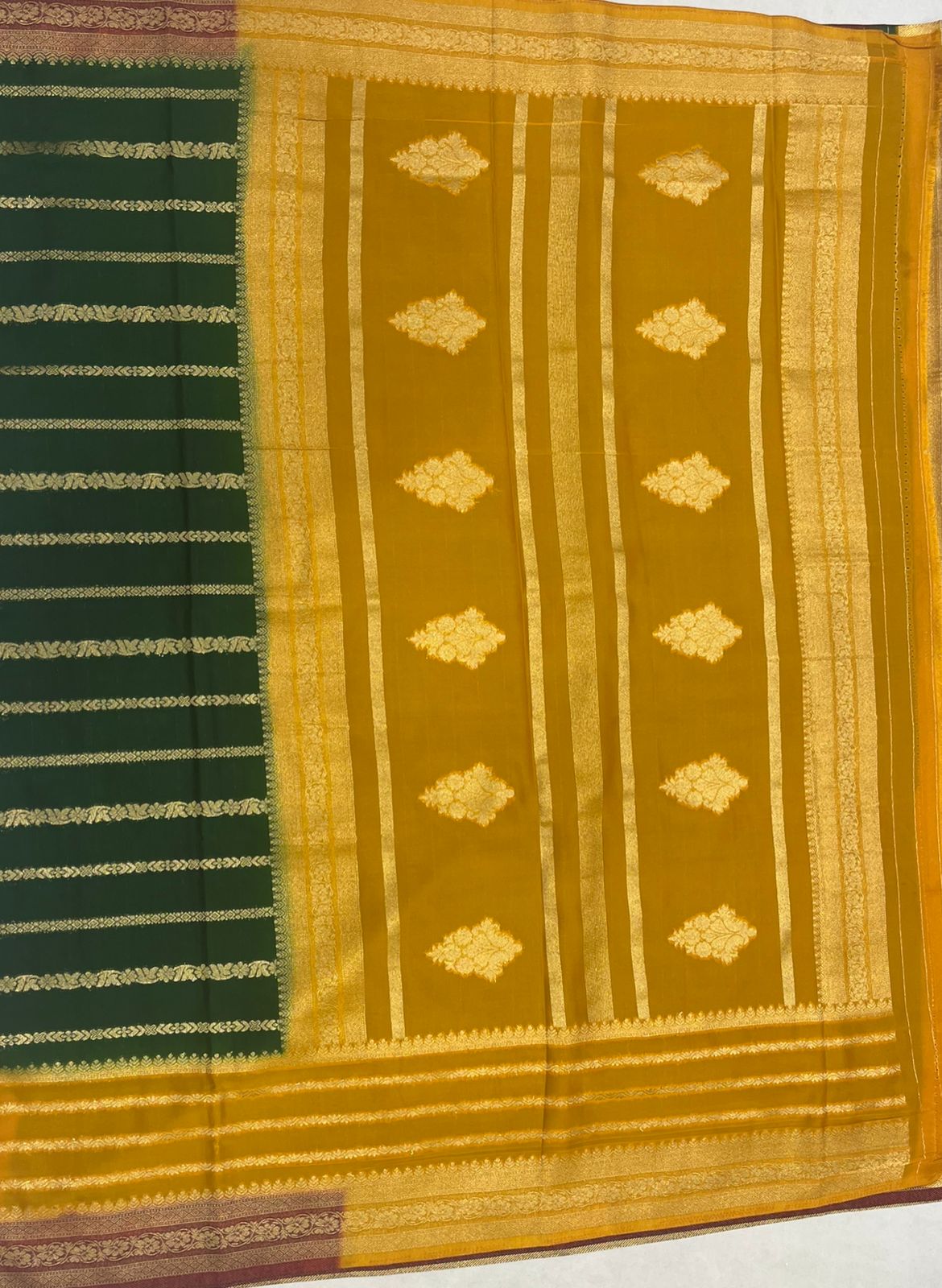 Elegant Green Crape Saree with multi color border.