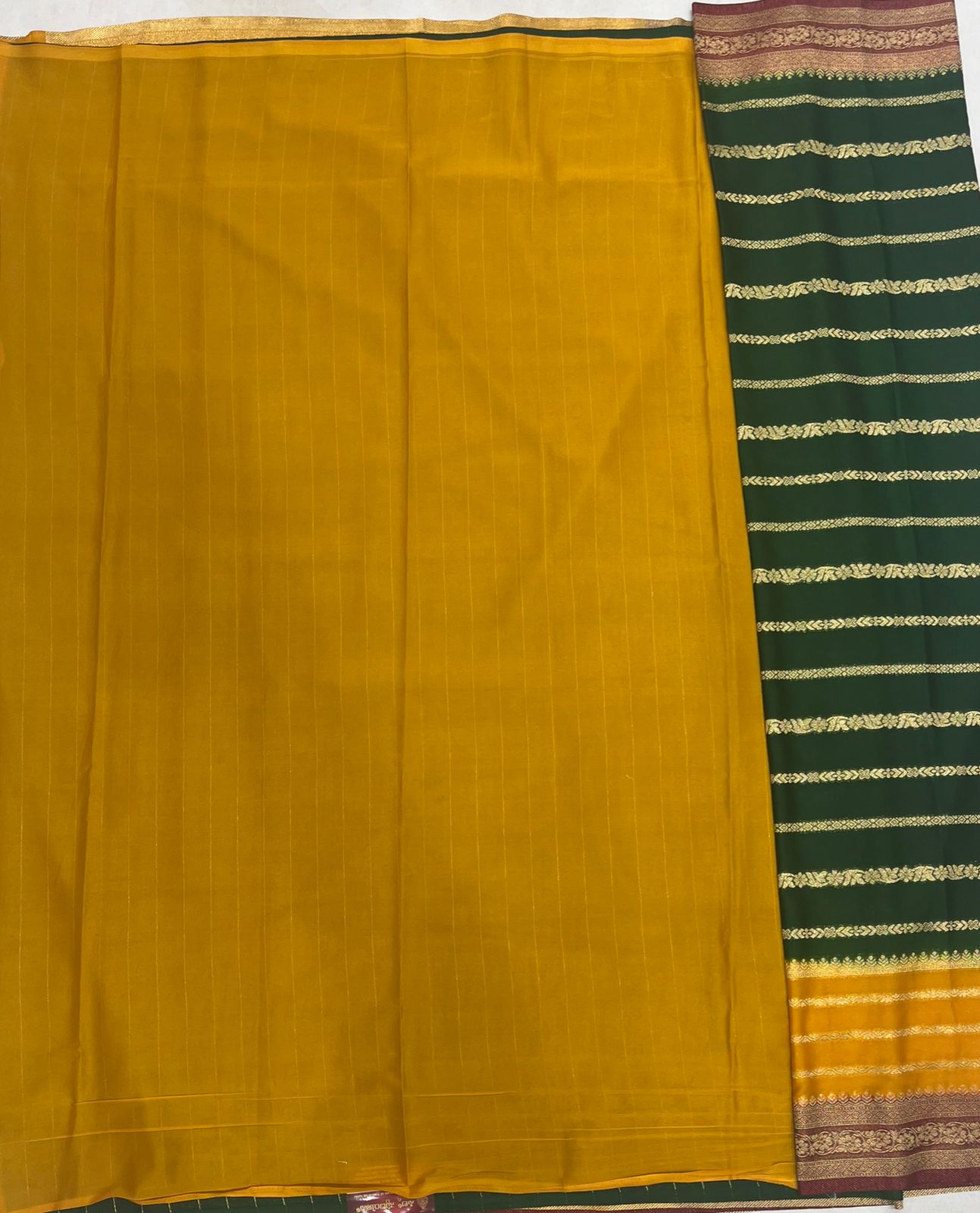 Elegant Green Crape Saree with multi color border.
