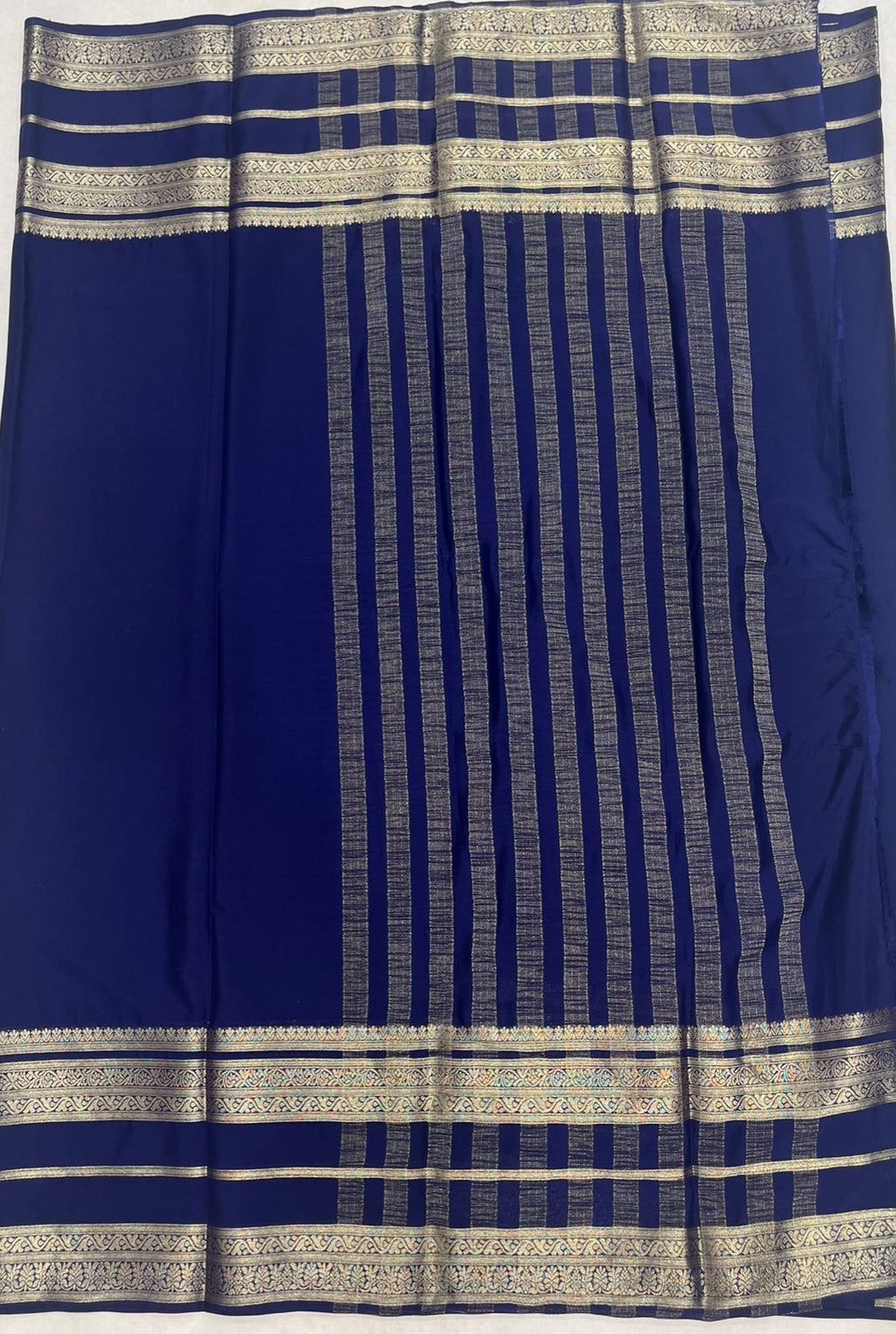 Navy Blue Premium Crape Saree with silver color border.