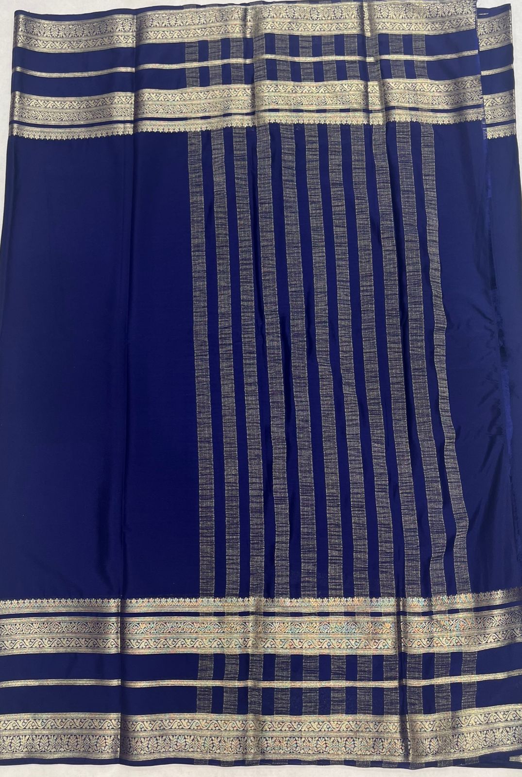Navy Blue Premium Crape Saree with silver color border.