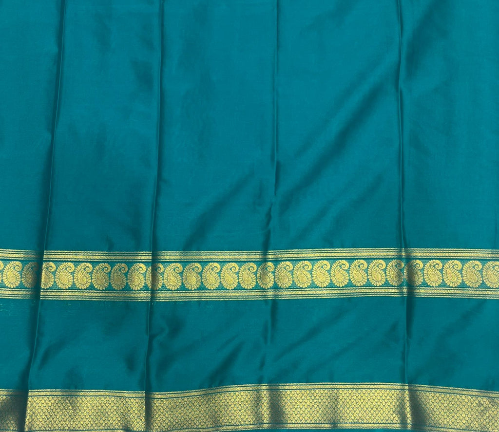 Teal Green Fancy Crepe Saree with Antique Gold Border