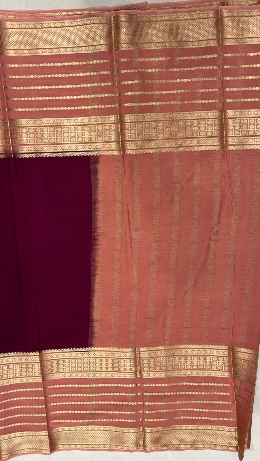 Maroon Premium Crape Saree with Pink striped border.