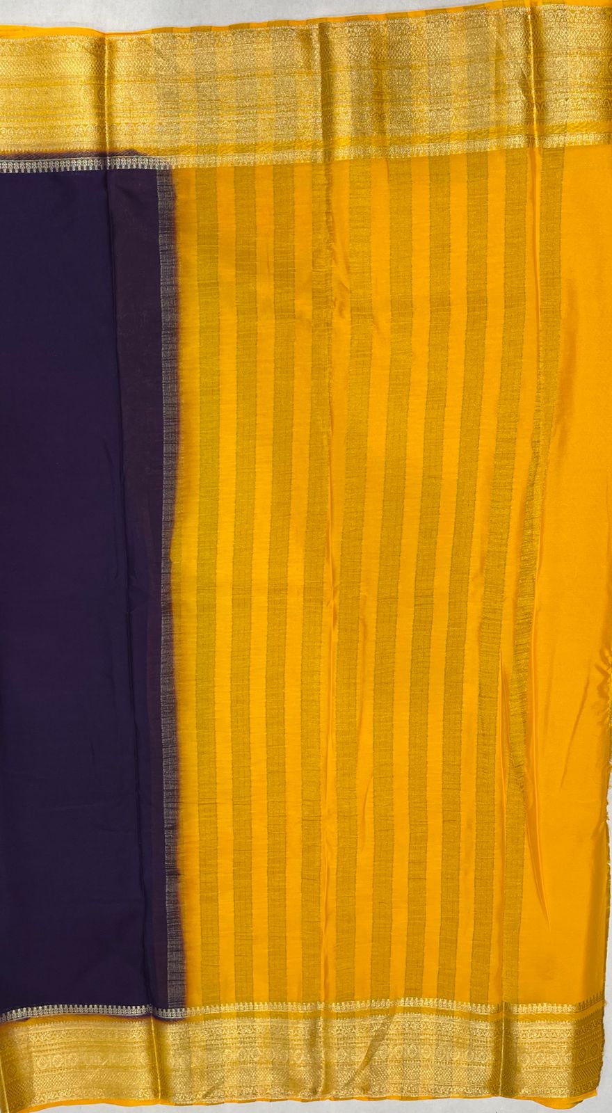Navy Blue Crape Saree with Premium Yellow border.