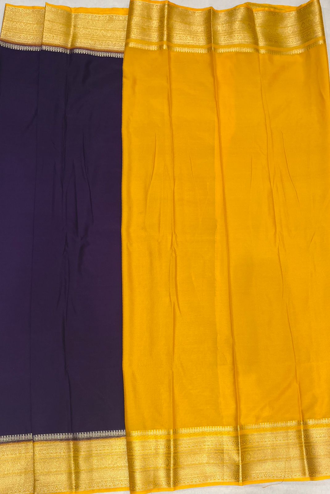 Navy Blue Crape Saree with Premium Yellow border.