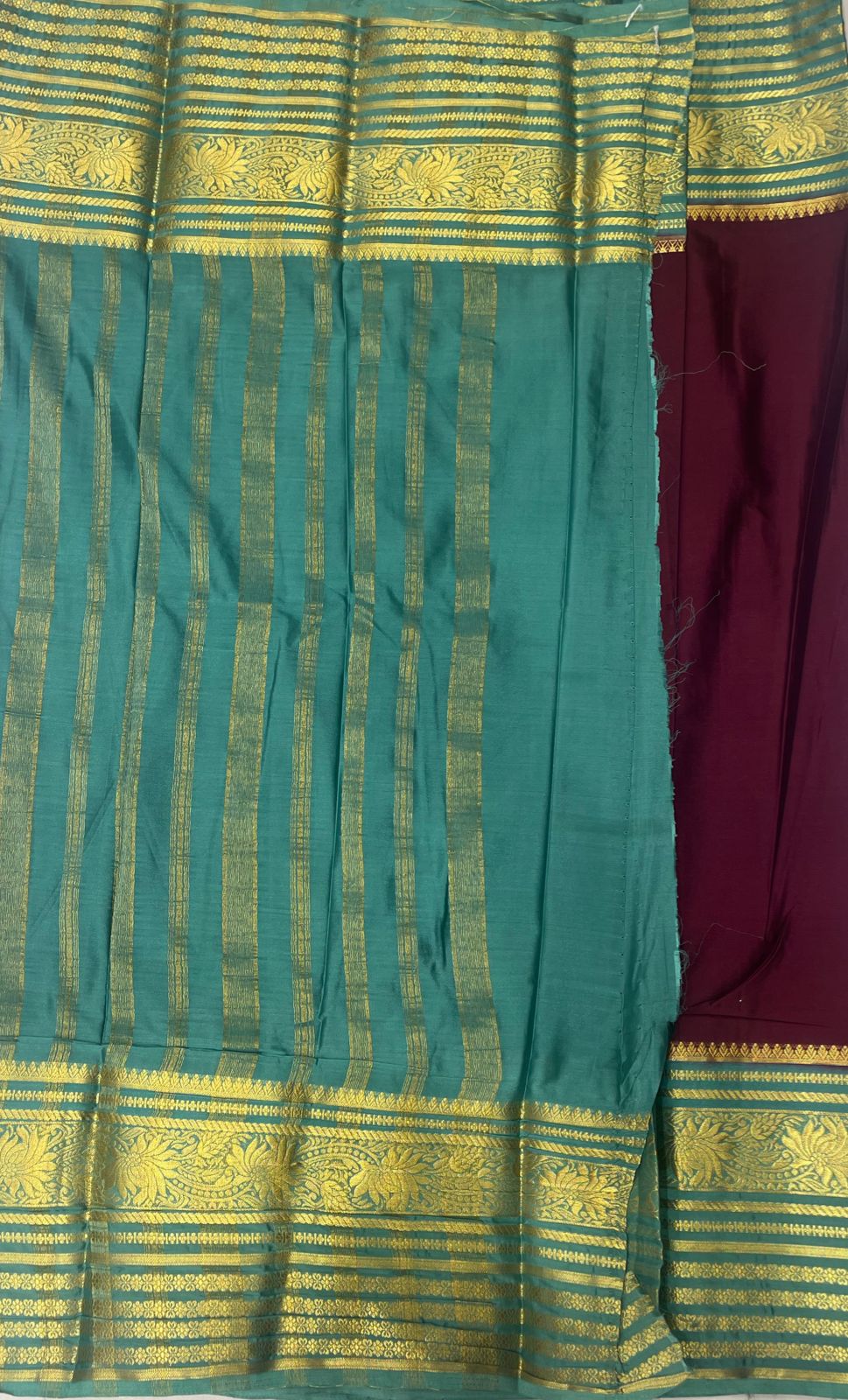 Dark Maroon Crape Saree with Premium Blue Striped border.