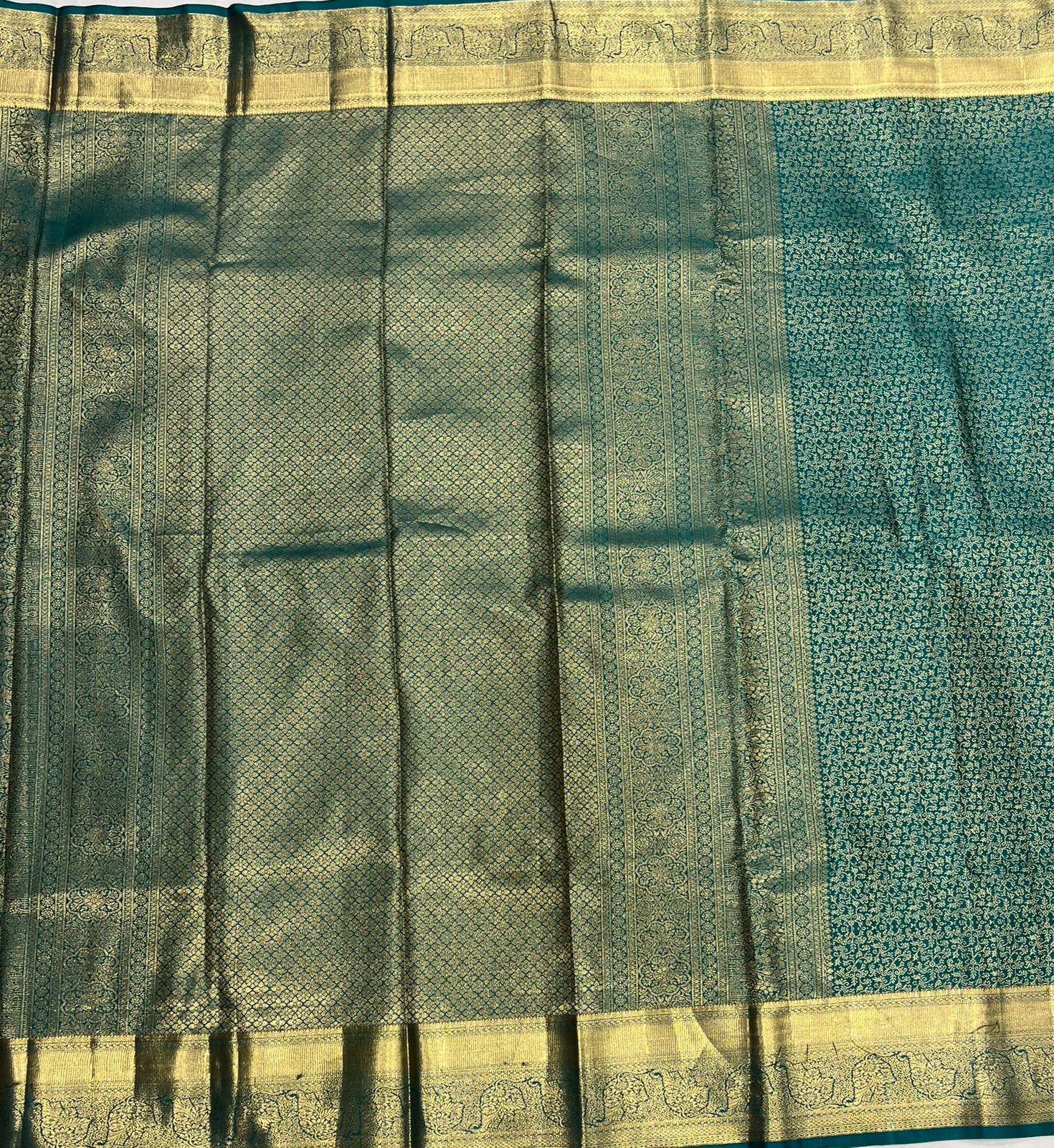 Elegant Peacock Green Tissue Saree with Rich Gold Border