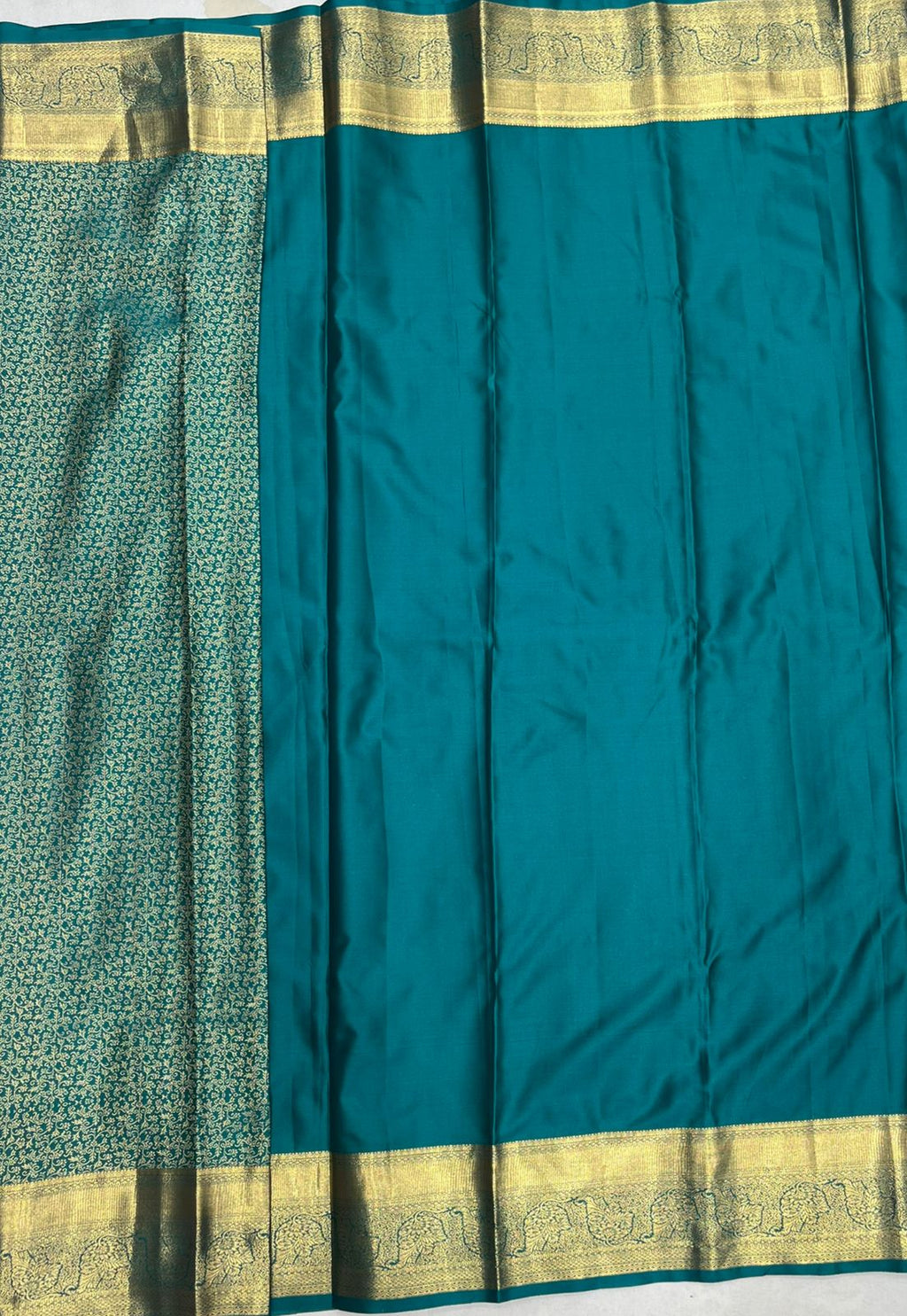Elegant Peacock Green Tissue Saree with Rich Gold Border