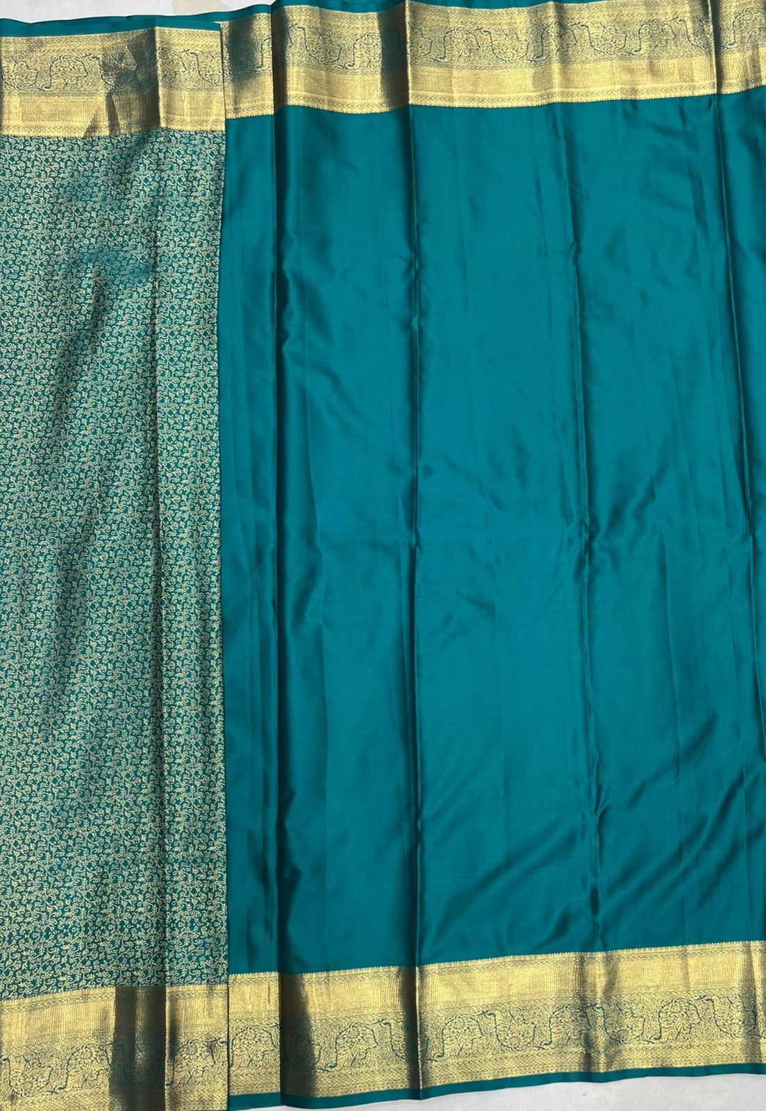 Elegant Peacock Green Tissue Saree with Rich Gold Border