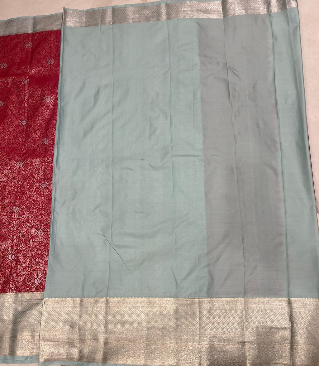 Graceful Pink Tissue Saree with Light Sky Blue Border