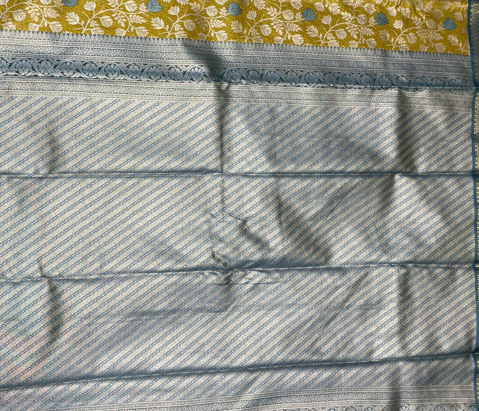 Elegant Lemon Yellow Tissue Saree with Classic Blue Border